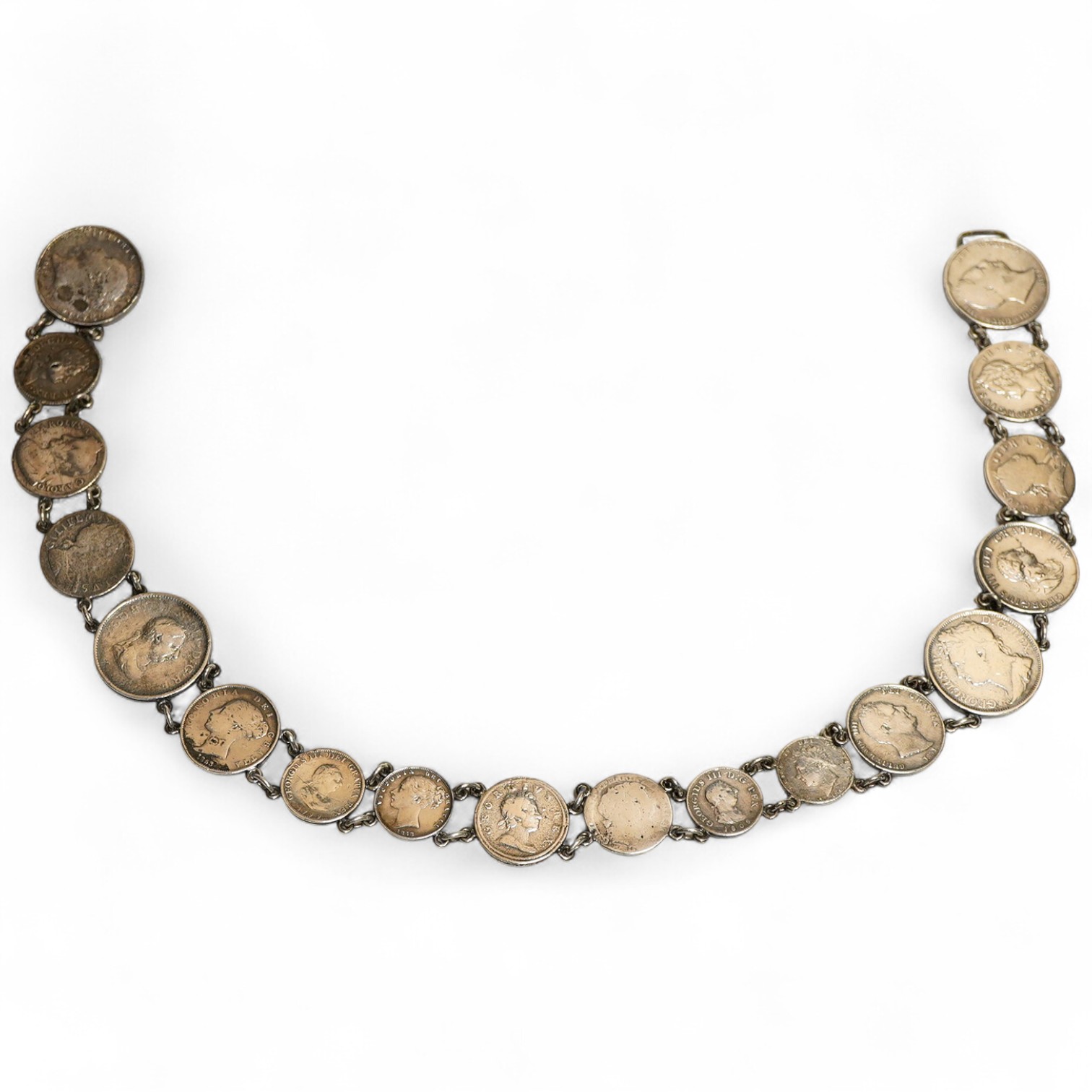 A Victorian silver and silver plated coin belt, formed of various coins Charles II and later, length 62 cm., gross weight approx. 6.65ozt